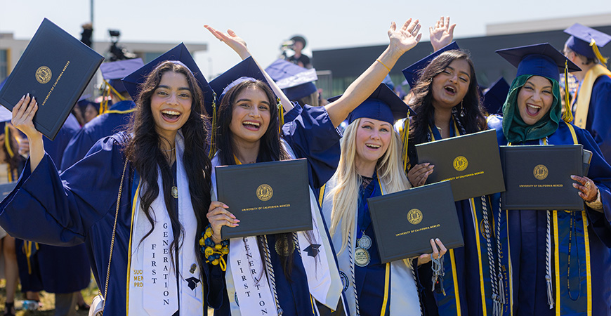 Group of five female graduates at commencement
